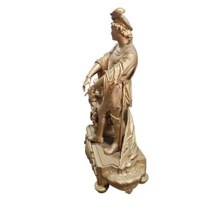 Pendule en régule à décor d'un gentilhomme...