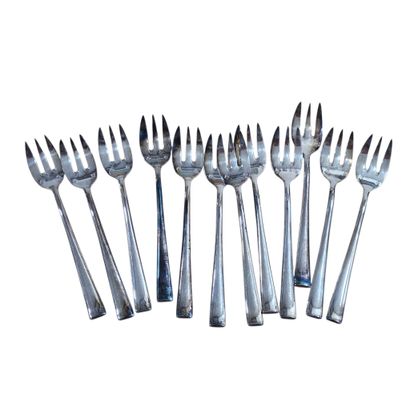 RAVINET DENFERT
Suite de douze fourchettes...