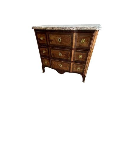 Chest of drawers with a raised panel in curled...