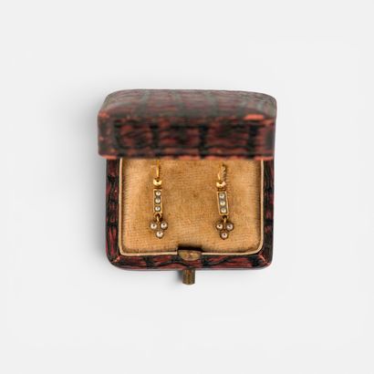 PAIR of 750° yellow gold hoop earrings adorned...