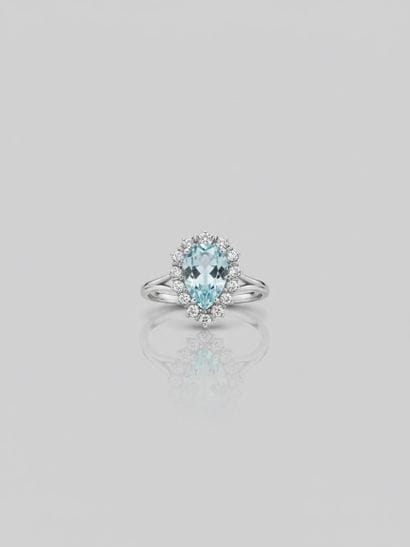 750° white gold RING set with an aquamarine...