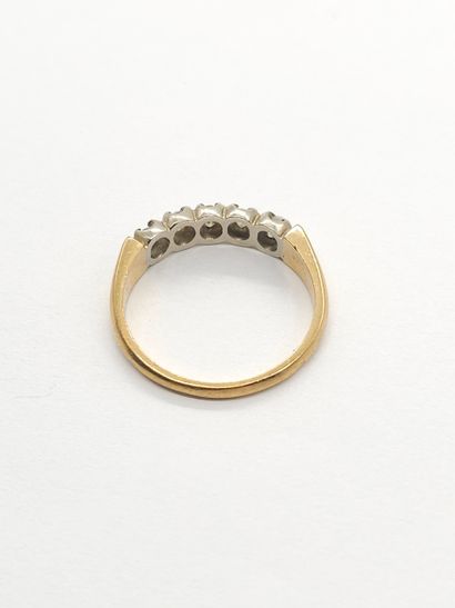 BAGUE jarretière en or deux tons 750° ornée...