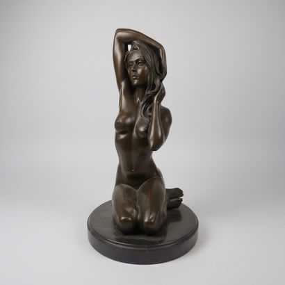 MANOLLO (20th century)
Woman on Her Knees
Bronze...
