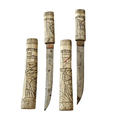JAPAN, 20th century
Pair of engraved bone...