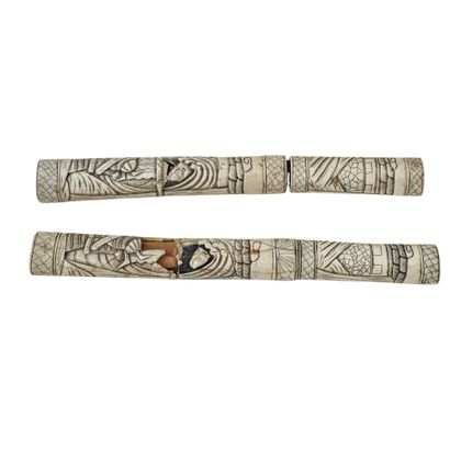 JAPAN, 20th century
Pair of engraved bone...