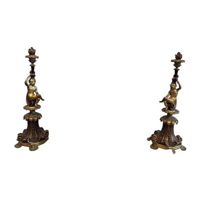 Pair of gilded bronze candlesticks with two...