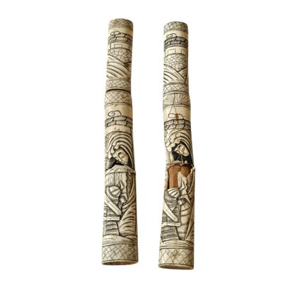 JAPAN, 20th century
Pair of engraved bone...