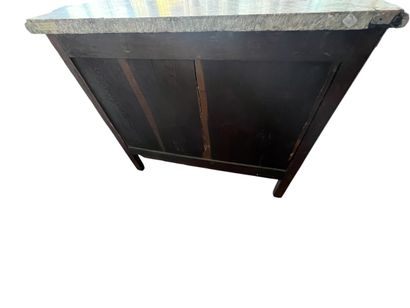 Chest of drawers with a raised panel in curled...