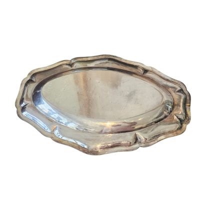Oblong meat platter with a scalloped edge,...