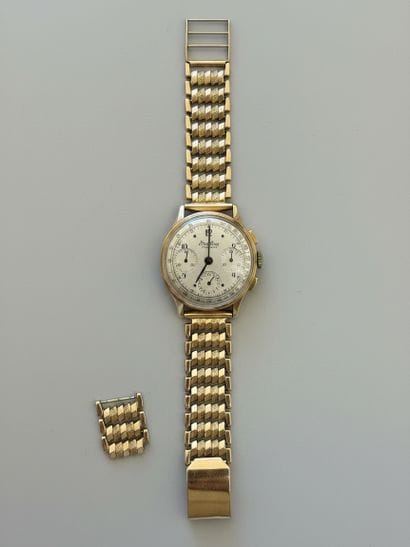BREITLING Premier
750° yellow gold wristwatch
Mechanical...
