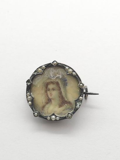 BROCHE circulaire en argent 925° ornée d'une...