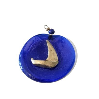 PENDENTIF en verre moulé de couleur bleue...