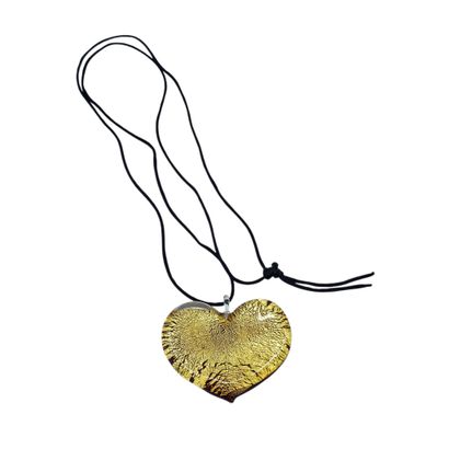 COLLIER sautoir en fil de soie noire accompagnée...