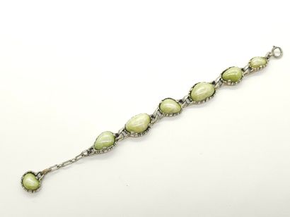 BRACELET en métal orné de cabochons de pierres...
