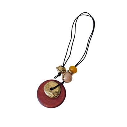 COLLIER pendentif en bois et métal sur c...
