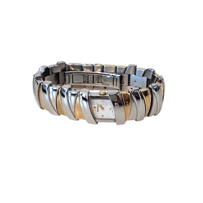 SEIKO
Montre bracelet de dame en acier doré...