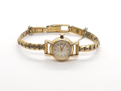 JUVENIA
Montre bracelet en métal doré, boitier...