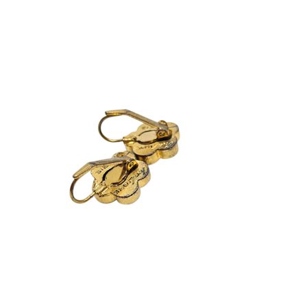 PAIRE de boucles d'oreilles en métal doré...