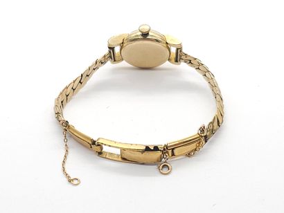 JUVENIA
Montre bracelet en métal doré, boitier...