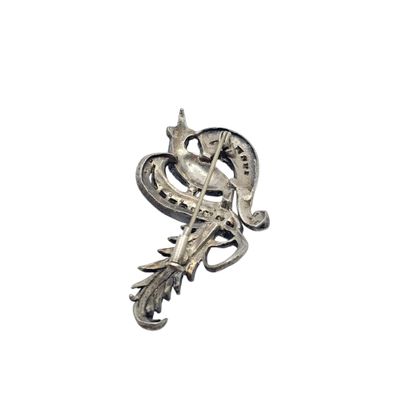 BROCHE en métal représentant un oiseau du...