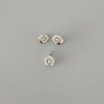 750° white gold EARRING SET consisting of:
A...