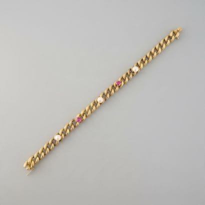750° yellow gold BRACELET adorned with three...