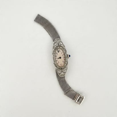 750° white gold watch bracelet, oval case...