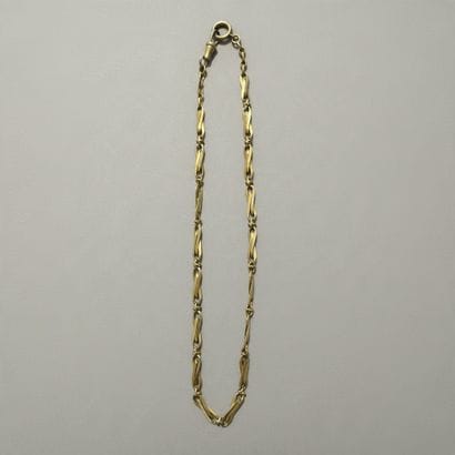 750° yellow gold chain for a vest
Weight:...