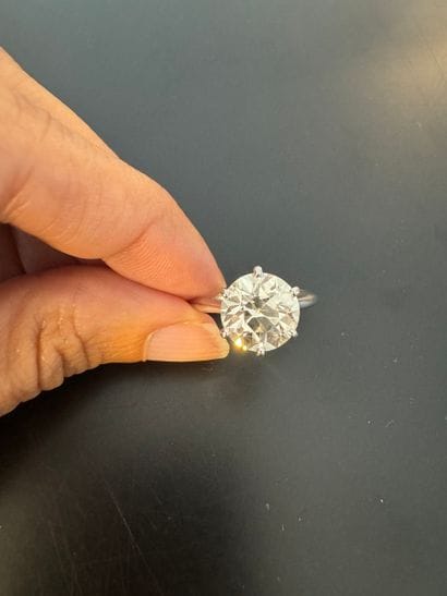 750° white gold solitaire ring set with an...