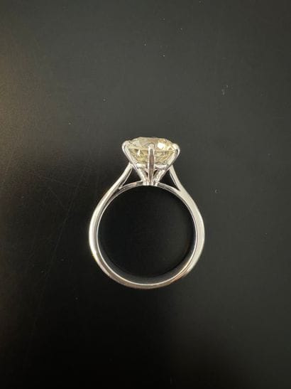750° white gold solitaire ring set with an...