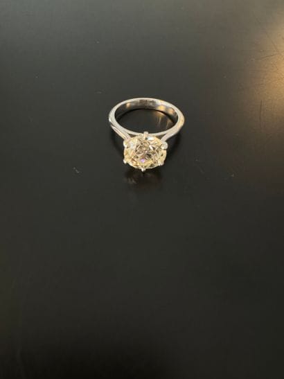 750° white gold solitaire ring set with an...