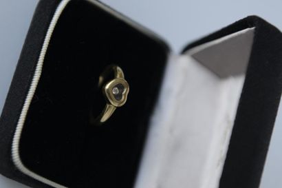 CHOPARD bague en or jaune 750° et diamant...