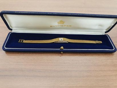 BUCHERER montre bracelet de dame en or jaune...