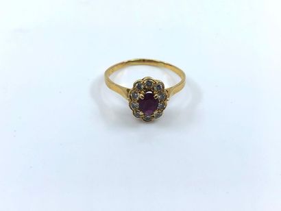 BAGUE marguerite en or jaune 750° ornée d'un...