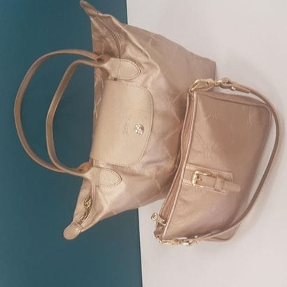 LONGCHAMP
Sac en toile plastifié à décor...