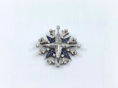 GUBELIN
BROCHE étoile en or gris 750° ornée...