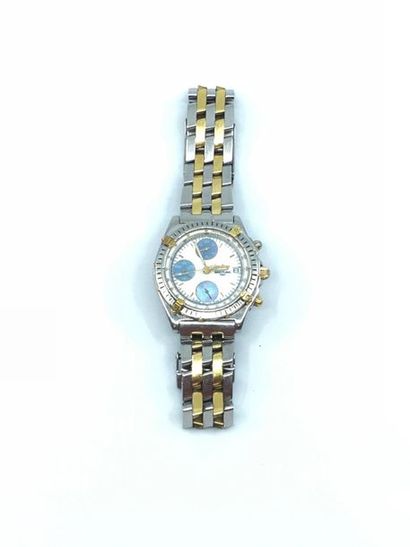 BREITLING 
Montre or et acier Chronomat à...