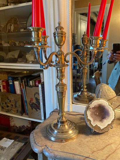Pair of metal candelabra, formerly silver...