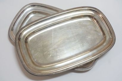 Four quadrangular dishes (sides: 36 cm) and...