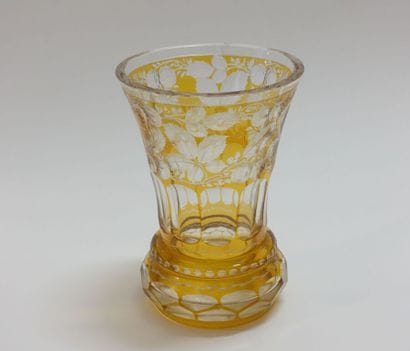 Translucent and yellow glass vase.

(Shine...