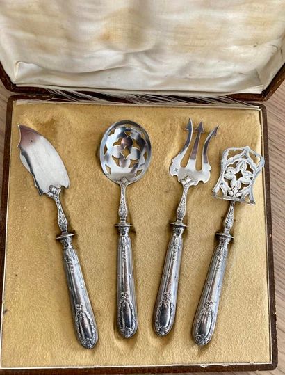 A case containing a carving set and a stuffed...