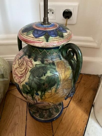Ceramic vase mounted as a lamp with vegetal...