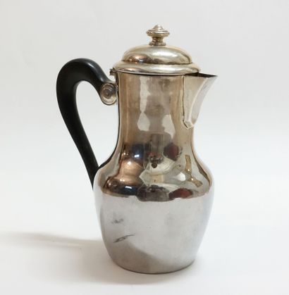 Silver pourer, ebony handle.

Monogrammed...