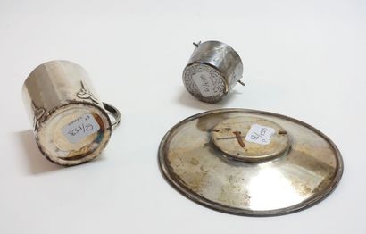 Silver cup and saucer with Celtic sword motifs....