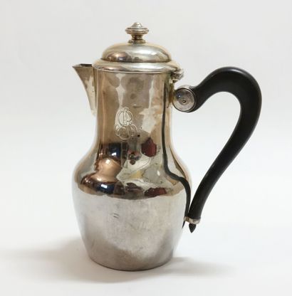 Silver pourer, ebony handle.

Monogrammed...