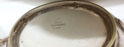 Oval teapot in silver plated metal with incised...