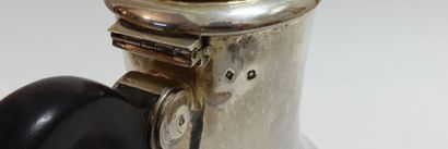 Silver pourer, ebony handle.

Monogrammed...