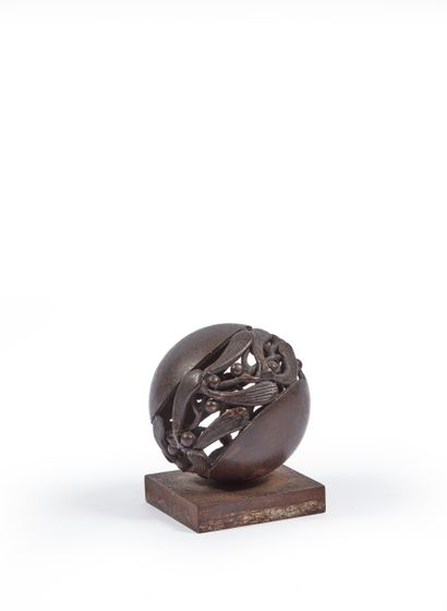 Wrought iron paperweight representing a stylized...