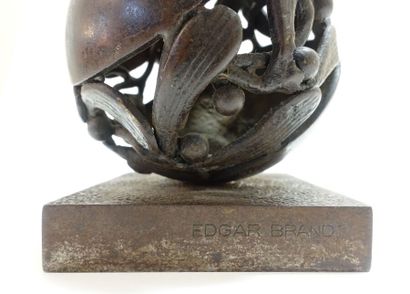 Wrought iron paperweight representing a stylized...