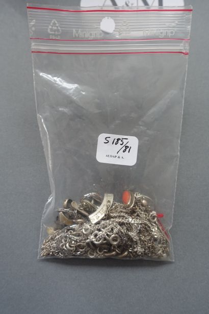 Silver and miscellaneous debris.

Gross weight:...